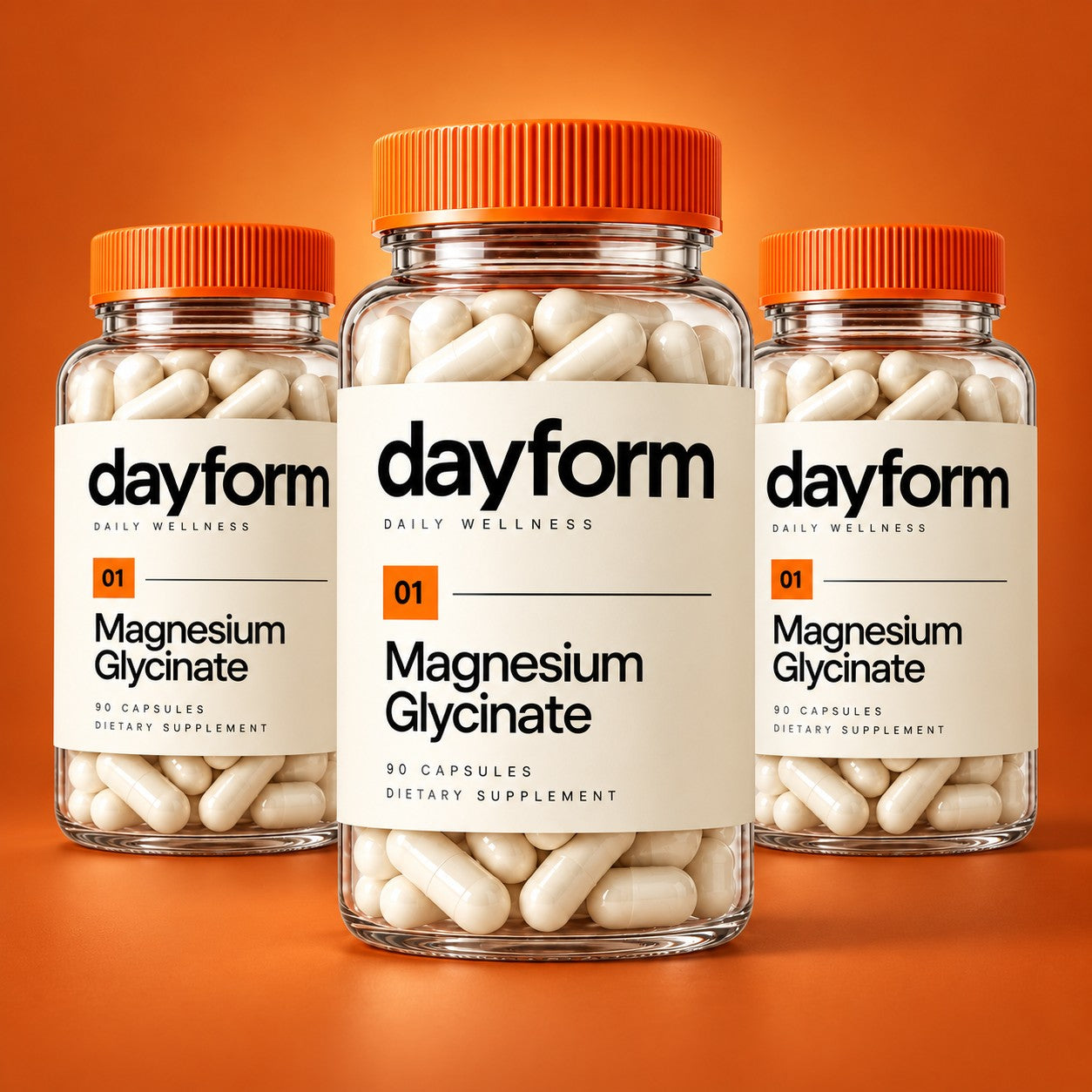 Three Dayform Magnesium Glycinate concept bottles with orange caps